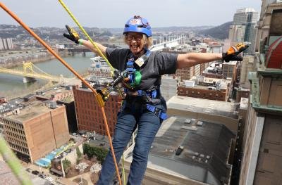 Thrill-seekers rappel down Pittsburgh skyscraper to raise money for nonprofit that helps children